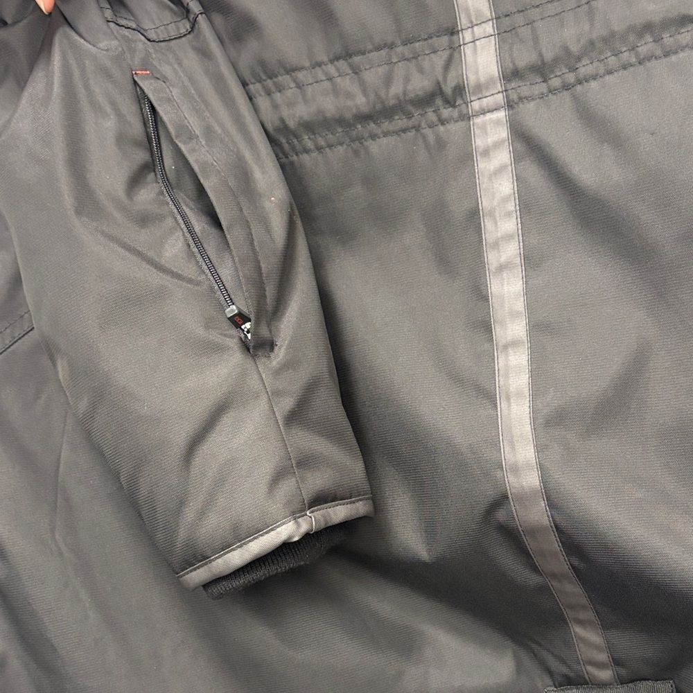 TUMI BLACK PUFFER COAT WITH TAN FUR TRIM. - Picture 9 of 16